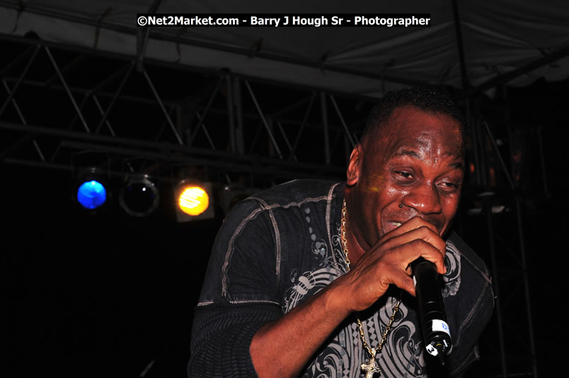 Lucea Cross the Harbour @ Lucea Car Park - All Day Event - Cross the Harbour Swim, Boat Rides, and Entertainment for the Family - Concert Featuring: Bushman, George Nooksl, Little Hero, Bushi One String, Dog Rice and many local Artists - Friday, August 1, 2008 - Lucea, Hanover Jamaica - Photographs by Net2Market.com - Barry J. Hough Sr. Photojournalist/Photograper - Photographs taken with a Nikon D300 - Negril Travel Guide, Negril Jamaica WI - http://www.negriltravelguide.com - info@negriltravelguide.com...!