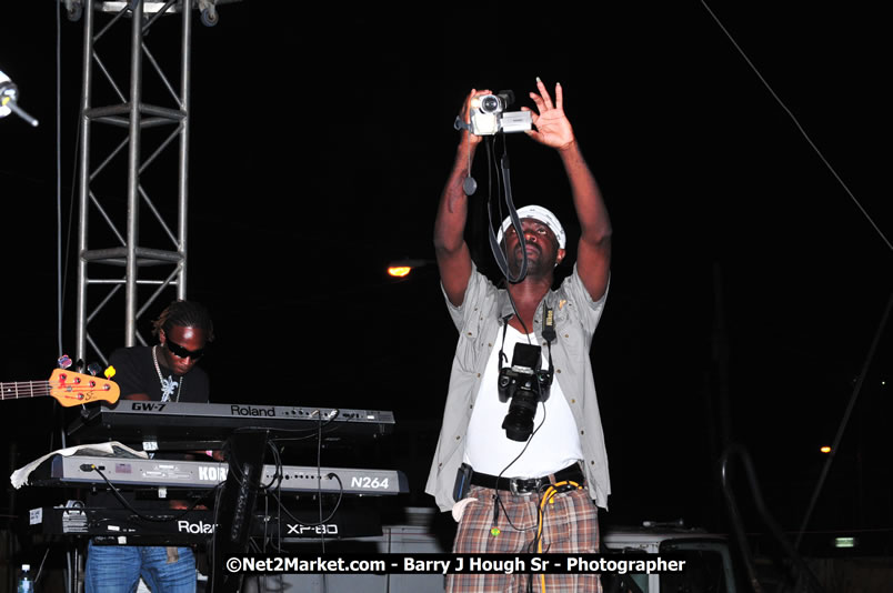 Lucea Cross the Harbour @ Lucea Car Park - All Day Event - Cross the Harbour Swim, Boat Rides, and Entertainment for the Family - Concert Featuring: Bushman, George Nooksl, Little Hero, Bushi One String, Dog Rice and many local Artists - Friday, August 1, 2008 - Lucea, Hanover Jamaica - Photographs by Net2Market.com - Barry J. Hough Sr. Photojournalist/Photograper - Photographs taken with a Nikon D300 - Negril Travel Guide, Negril Jamaica WI - http://www.negriltravelguide.com - info@negriltravelguide.com...!