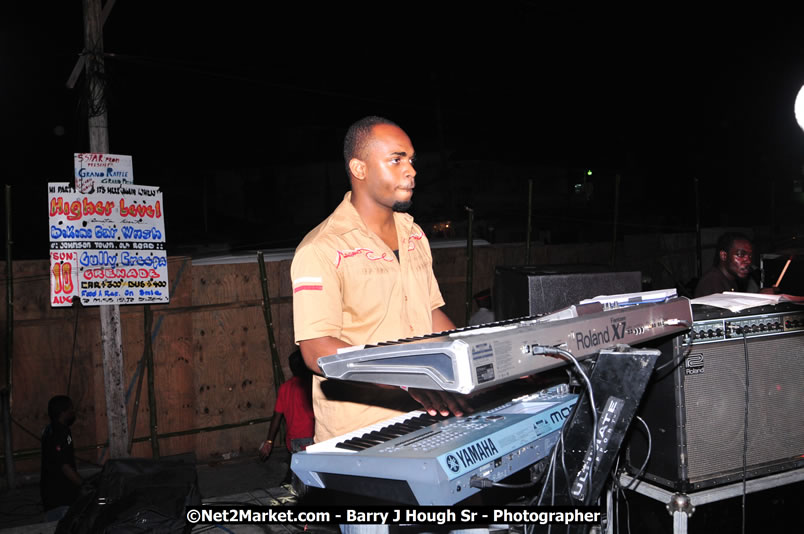 Lucea Cross the Harbour @ Lucea Car Park - All Day Event - Cross the Harbour Swim, Boat Rides, and Entertainment for the Family - Concert Featuring: Bushman, George Nooksl, Little Hero, Bushi One String, Dog Rice and many local Artists - Friday, August 1, 2008 - Lucea, Hanover Jamaica - Photographs by Net2Market.com - Barry J. Hough Sr. Photojournalist/Photograper - Photographs taken with a Nikon D300 - Negril Travel Guide, Negril Jamaica WI - http://www.negriltravelguide.com - info@negriltravelguide.com...!