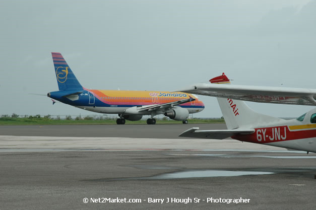 Air Jamaica Airline - Landing & Take Off - MBJ Airports Limited - Sangster International Airport - Domestic Terminal - Montego Bay, St James, Jamaica W.I. - MBJ Limited - Transforming Sangster International Airport into a world class facility - Photographs by Net2Market.com - Negril Travel Guide, Negril Jamaica WI - http://www.negriltravelguide.com - info@negriltravelguide.com...!