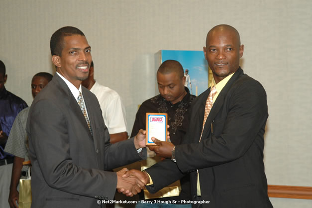 Red Cap Porters Awards - Minister of Tourism, Hon. Edmund Bartlett - Director of Tourism, Basil Smith - Friday, December 14, 2007 - Holiday Inn Sunspree, Montego Bay, Jamaica W.I. - Photographs by Net2Market.com - Barry J. Hough Sr, Photographer - Negril Travel Guide, Negril Jamaica WI - http://www.negriltravelguide.com - info@negriltravelguide.com...!