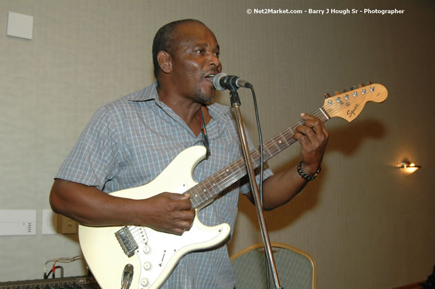 Red Cap Porters Awards - Minister of Tourism, Hon. Edmund Bartlett - Director of Tourism, Basil Smith - Friday, December 14, 2007 - Holiday Inn Sunspree, Montego Bay, Jamaica W.I. - Photographs by Net2Market.com - Barry J. Hough Sr, Photographer - Negril Travel Guide, Negril Jamaica WI - http://www.negriltravelguide.com - info@negriltravelguide.com...!